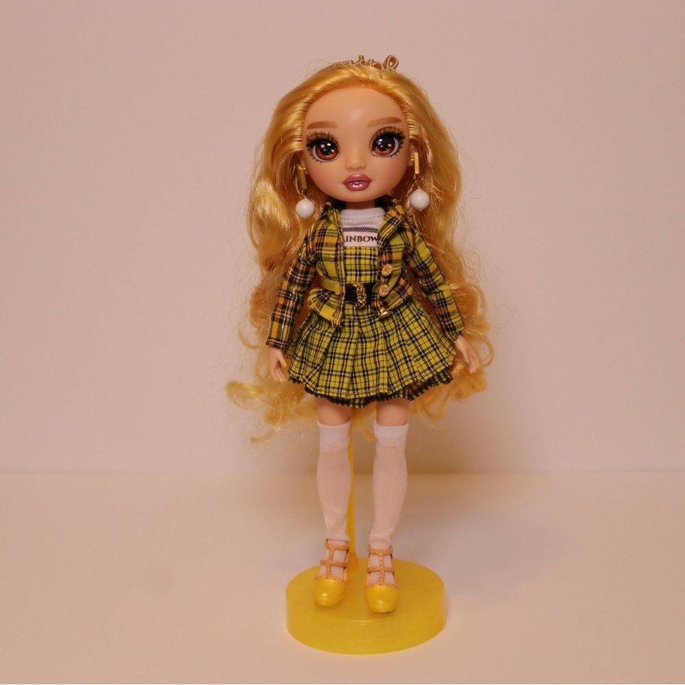 Rainbow high doll with stand